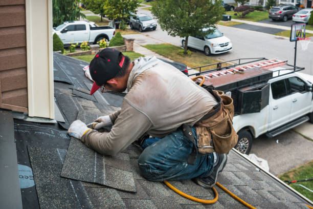 Professional Storm Damage Roof Repair technician working in Chestnut Hill, MA